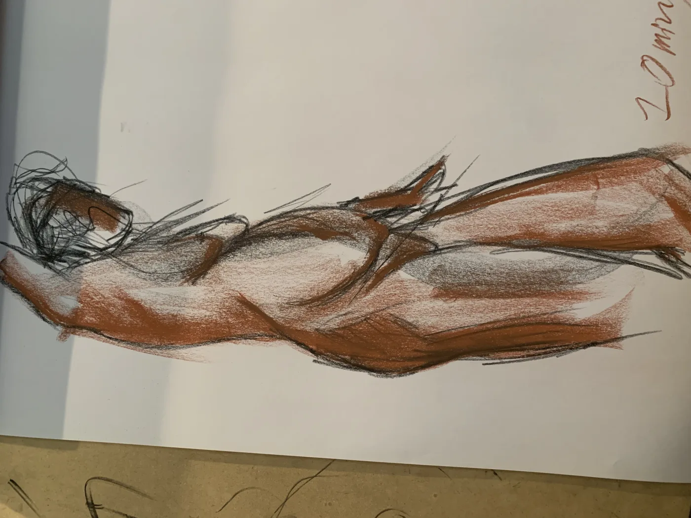 Figure study in conte and charcoal